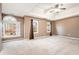 Spacious main bedroom with large windows and plush carpeting at 40 Brompton Dr, Dallas, GA 30157