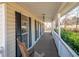 Spacious front porch with rocking chair and railing at 40 Brompton Dr, Dallas, GA 30157