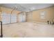 Large two-car garage with ample storage space at 8967 Midlothian Ct, Winston, GA 30187