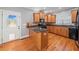 Kitchen with granite countertops and wood cabinets at 8967 Midlothian Ct, Winston, GA 30187