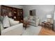 Cozy living room featuring neutral-toned furniture and hardwood floors at 1049 Laurel Valley Sw Dr, Marietta, GA 30064