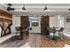 Basement recreation room with sliding barn doors that lead into the Gathering room at 11644 Parkside Ave, Alpharetta, GA 30005