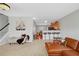 Inviting living room featuring hardwood floors, modern furniture, and an open floor plan at 2116 Tidal Cv, Lawrenceville, GA 30043