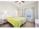 Spacious primary bedroom with two windows and a ceiling fan at 2445 Santa Rosa St, Alpharetta, GA 30009