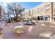 Upscale community courtyard with fountain, seating, and brick pavers at 2445 Santa Rosa St, Alpharetta, GA 30009