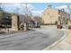 Curved road leading to the gated Sonoma community at 2445 Santa Rosa St, Alpharetta, GA 30009