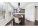 Bright dining room with hardwood floors and a built-in buffet at 2445 Santa Rosa St, Alpharetta, GA 30009