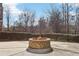 Brick fire pit in a community courtyard at 2445 Santa Rosa St, Alpharetta, GA 30009