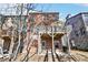 Brick townhouse with deck, patio, and fenced backyard at 2445 Santa Rosa St, Alpharetta, GA 30009