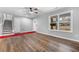 Bright and airy living room with hardwood floors and large windows at 85 Hickory Dr, Stockbridge, GA 30281