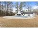 Home with inground pool and covered patio at 85 Hickory Dr, Stockbridge, GA 30281