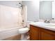 Bathroom with tub shower combo and single vanity at 8504 Browns Mill Trce, Lithonia, GA 30038