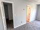Bedroom featuring neutral paint, new carpet and trim at 8504 Browns Mill Trce, Lithonia, GA 30038