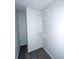Walk-in closet with installed shelving for optimized storage at 8504 Browns Mill Trce, Lithonia, GA 30038
