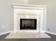 Cozy fireplace with marble hearth and surround, perfect for relaxing evenings at 8504 Browns Mill Trce, Lithonia, GA 30038
