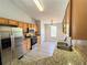 Modern kitchen with stainless steel appliances, granite countertops, and hardwood floors at 8504 Browns Mill Trce, Lithonia, GA 30038