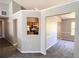 Open floor plan with gray walls and new carpeting at 8504 Browns Mill Trce, Lithonia, GA 30038