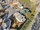 Aerial view of house, deck, and backyard; located on a quiet cul-de-sac at 902 College Place Nw Ct, Kennesaw, GA 30144