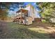 House with deck, storage shed, and landscaped yard at 902 College Place Nw Ct, Kennesaw, GA 30144