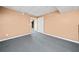 Finished basement offering extra living space with grey carpeting at 902 College Place Nw Ct, Kennesaw, GA 30144