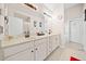 Double vanity bathroom with ample storage and modern fixtures at 902 College Place Nw Ct, Kennesaw, GA 30144