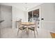 Bright dining area with table and chairs, adjacent to kitchen at 902 College Place Nw Ct, Kennesaw, GA 30144