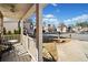 Cozy front porch with seating area and neighborhood view at 902 College Place Nw Ct, Kennesaw, GA 30144
