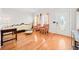 Bright living room with hardwood floors and comfy seating at 902 College Place Nw Ct, Kennesaw, GA 30144
