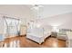 Large main bedroom with hardwood floors and vaulted ceilings at 902 College Place Nw Ct, Kennesaw, GA 30144
