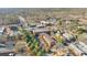 Aerial view of townhomes near shops and restaurants at 235 Founders Mill Ct, Roswell, GA 30075