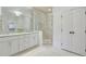 Elegant bathroom with double vanity, large shower, and ample storage at 235 Founders Mill Ct, Roswell, GA 30075