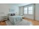 Charming bedroom with hardwood floors, window shutters and a tranquil atmosphere at 235 Founders Mill Ct, Roswell, GA 30075