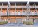 Row of brick townhouses featuring balconies and garages at 235 Founders Mill Ct, Roswell, GA 30075