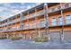 Brick townhomes with private garages and balconies at 235 Founders Mill Ct, Roswell, GA 30075