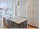 Spacious kitchen with island, stainless steel appliances, and ample cabinetry at 235 Founders Mill Ct, Roswell, GA 30075
