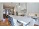 Eat-in kitchen features a large island and high-end appliances at 235 Founders Mill Ct, Roswell, GA 30075