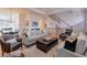 Bright and open living room with a staircase, hardwood floors and comfortable seating at 235 Founders Mill Ct, Roswell, GA 30075