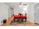 Dining room with hardwood floors and red tablecloth at 2735 Spring Se Dr, Smyrna, GA 30080