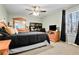 Comfortable bedroom with a double bed and built-in desk at 118 Michael Ct, Dallas, GA 30157