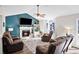 Living room featuring a fireplace, vaulted ceiling and brown recliners at 118 Michael Ct, Dallas, GA 30157