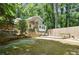 Spacious backyard with a deck and wooded area at 2038 Clairmont Ne Ter, Atlanta, GA 30345