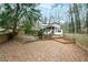 House with a large backyard and gravel area at 2038 Clairmont Ne Ter, Atlanta, GA 30345