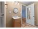 Small bathroom with vanity, mirror, and access to another room at 2038 Clairmont Ne Ter, Atlanta, GA 30345