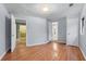 Spacious bedroom with hardwood floors and access to bathroom at 2038 Clairmont Ne Ter, Atlanta, GA 30345