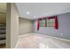 Cozy bedroom with grey walls and tile floors at 2038 Clairmont Ne Ter, Atlanta, GA 30345