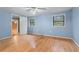 Light-filled bedroom with hardwood floors and ceiling fan at 2038 Clairmont Ne Ter, Atlanta, GA 30345