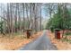 Driveway entrance with stone pillars at 2038 Clairmont Ne Ter, Atlanta, GA 30345