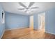 Bright main bedroom featuring hardwood floors and ensuite bathroom access at 2038 Clairmont Ne Ter, Atlanta, GA 30345