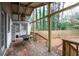 Brick patio with covered porch and wooded views at 2038 Clairmont Ne Ter, Atlanta, GA 30345