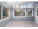 Sunroom with many windows and light grey walls at 2038 Clairmont Ne Ter, Atlanta, GA 30345